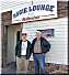 Guy and Doug in front of Aggie Lounge
